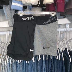 2 pairs of Nike Pro’s